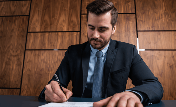 A translator reviews a legal contract for Translation Services in McCandles, ensuring precise terms for a local business.