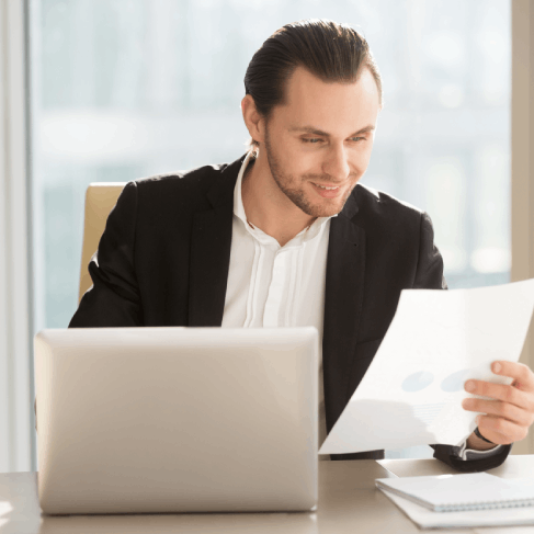 A translator working on immigration docs in Bethel Park, including naturalization certificates and green card applications.