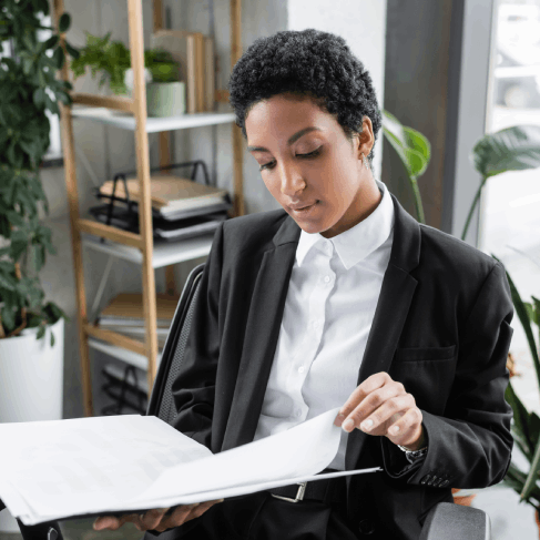 The lawyer uses a contract clause for Translation Services in McCandles, ensuring precise legal terms and layout.