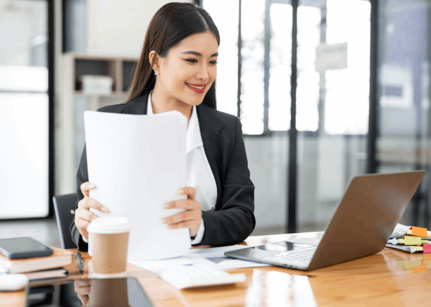 A translator assisting with personal document translation services in Robinson Township for legal and academic use.