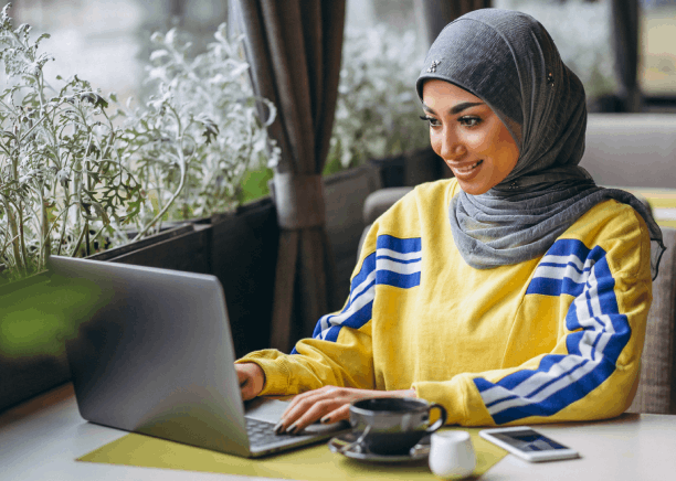 A client reviews a certified Arabic translation with a notary in downtown Pittsburgh, using Arabic Translation Services.