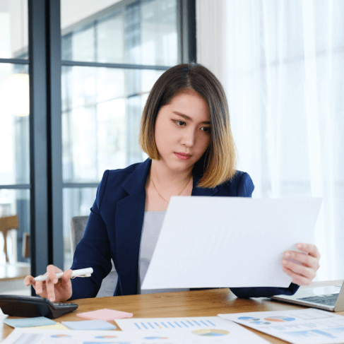 A translator working through the translation process, ensuring high quality standards for Birth Certificate translation.