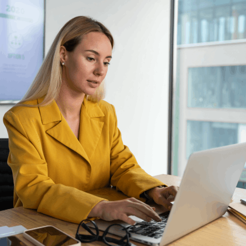 A translator working on USCIS approved translations for a client in Ross Township, ensuring document approval.
